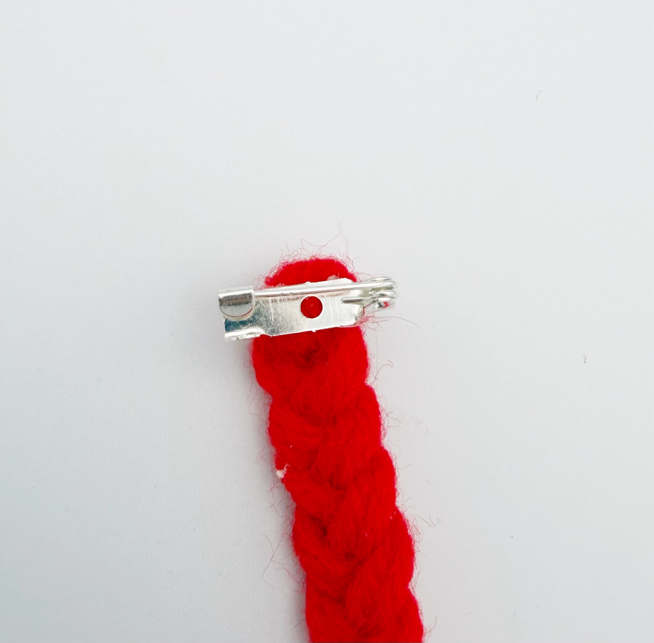 Short Red Tassel Lapel Pin